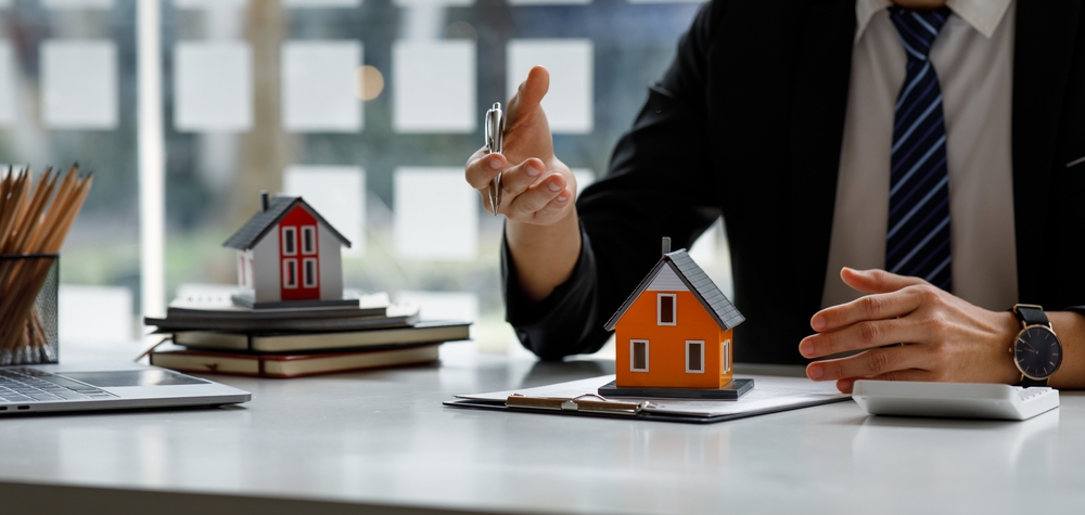 Real estate broker agent presenting and consult to customer to decision